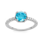 sterling silver cz band with round light blue cz